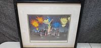 Framed photo print of Tinker Bell flying over a castle with fireworks at night.