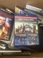Photo of Blu-ray movies including Ghostbusters 3-movie collection and Run Lola Run 4K UHD among others.