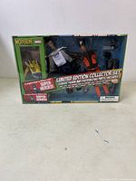 Full view of boxed Limited Edition Wolverine Collector Set featuring figure and parts inside original packaging