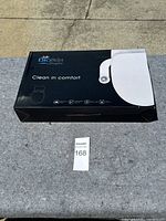 Top view of Bio Bidet SlimGlow bidet box showing product name and key features.