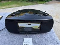 Front view of Coby combo unit showing display screen and controls