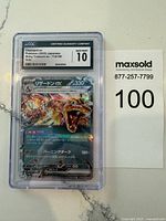 Front view of the CGC graded Charizard ex Pokémon card showing holo artwork and grade 10 label.