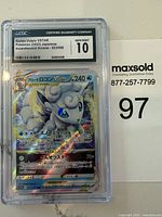 Photo of the Alolan Vulpix VSTAR Pokémon card graded GEM MINT 10 by CGC in protective plastic case