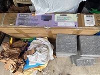 Full view of sealed Rocelco ADR-46 desk riser box on floor