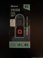 Front of sealed box showing brand, model and 4GB capacity