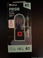 Front of sealed box showing Börne Prism MP3 player, 4GB marking