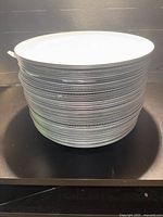 Stack of silver charger plates