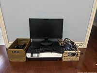 Overall lot: monitor, printer, keyboard, mouse, two baskets