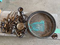Group shot showing tray, candlesticks, flatware