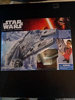 Front of factory-sealed Star Wars The Force Awakens Millennium Falcon box