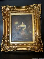 Full view of vintage oil painting featuring a seated woman with ornate gold frame.