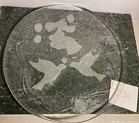 Top view showing full embossed anniversary design with doves, bells, ribbons, and floral motifs