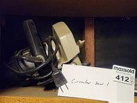 Photo of the circular saw showing overall body, power cord, and blade guard.