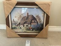 Frontal view of framed print with protective corner covers