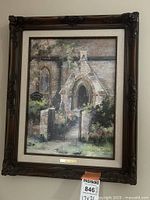 Front view of framed print showing artwork and ornate frame