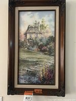 Front view of framed limited edition print showing the English garden cottage scene.