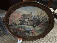 Full view of framed limited edition print "The Chaplain's Garden" depicting an English garden and cottage scene.