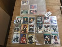 Overview of two 9-pocket binder pages showing all 21 cards