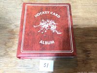 Front cover of red Hockey Card Album binder