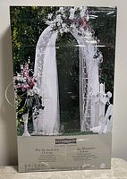 Box showing the Celebrate It branded packaging with an image of the assembled arch decorated with flowers and fabric, indicating it is 8 ft tall and pre-lit.