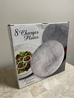 Box of 8 charger plates with antique silver finish, showing front with plate image and salad.