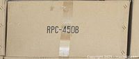 Box labeled RPC-450B showing the server case model number and confirming the lot contents.