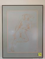 Full view of framed conte drawing of reclining nude figure showing entire artwork and frame