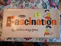 Closed box packaging of Remco Fascination Electric Maze Game with vintage 1961 style graphics.
