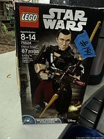 Box of LEGO Star Wars buildable figure set 75524 featuring Chirrut Îmwe with 87 pieces, ages 8-14.