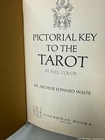 Close-up photo of the book's title page showing 'Pictorial Key to the Tarot in Full Color' by Arthur Edward Waite and publisher Causeway Books.