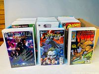 Front view showing stacks with Star Trek Discovery, Batman Detective Comics and The Thing issues
