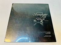 Front cover of the factory sealed vinyl LP with the title Duke Ellington Symphony in Black and an image of a person wearing a bow tie.