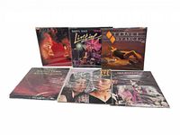 Six classic vinyl albums displayed in two rows, front-facing showing album cover art.