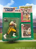 Front view of the sealed Barry Foster action figure in original 1993 Starting Lineup packaging showing figure, helmet accessory, and two collector cards.