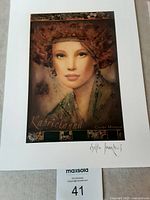 Lithograph art print titled 'Kapricianna' featuring a woman with elaborate crown, printed signature by Csaba Markus on lower right.