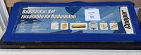 Original packaging of Cooper badminton set indicating contents and brand.