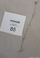 Full view of bracelet showing length, crystal elements, and clasp.