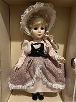 Full view of the Effanbee Little Bo-Peep doll dressed in Victorian era clothing inside a box.