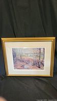 Full view of framed limited edition print 'Kings Landing, New Brunswick' by Peter Etril Snyder showing autumn landscape scene with trees and houses.
