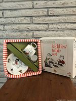 Photo of vintage Arklow Kiddies Table Set in original box showing box design and inside packaging with cup, bowl, and egg cup inside.