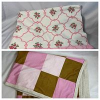 Two blankets displayed, one showing checkered pink and brown pattern with Sherpa lining, the other a white blanket with pink rose floral design and satin trim.
