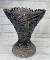 Front angle showing hobstar pattern and scalloped rim with iridescent smoke purple finish.