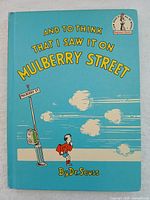 Front cover of 1964 Dr. Seuss book "And to Think That I Saw It on Mulberry Street" with illustration and title.