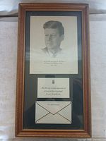 Framed drawing with letter and envelope inside