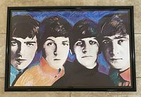 Full view of the framed Beatles poster showing the entire artwork and frame.
