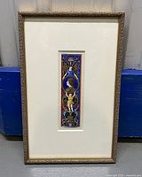 Framed print showing full view within an ornate golden frame and white mat.