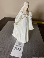 Front view of the Royal Doulton Bride figurine showing full figure and dress details.