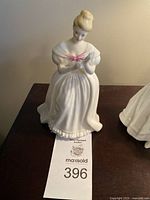 Front view of the Royal Doulton 'Denise' figurine showing full figure and dress details