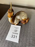 Front angle of the Ki Rin Unicorn Mother figure showing the detailed horn, face, and scaled body.