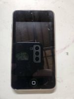 Front view of iPod Touch showing screen off and physical home button